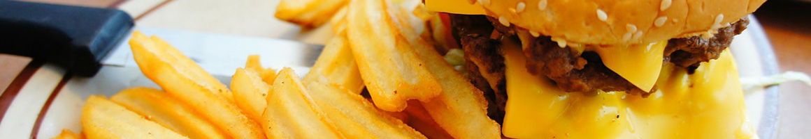 Eating American (Traditional) Burger Seafood at Bayou Joes Marina & Grill restaurant in Panama City, FL.